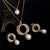 Elegant Simulated Pearl and Crystal Necklace & Earring Sets